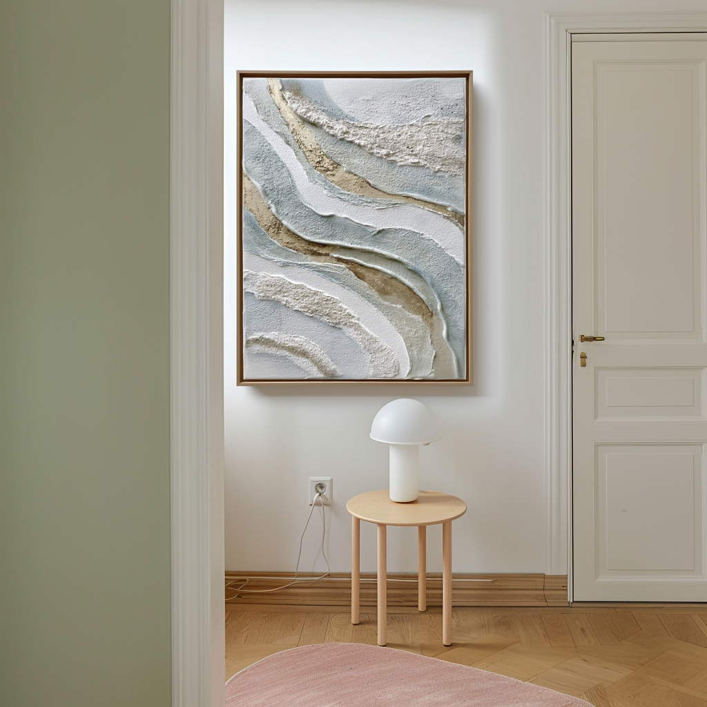 Textured abstract wall art with layered neutral tones in beige, white, and blue