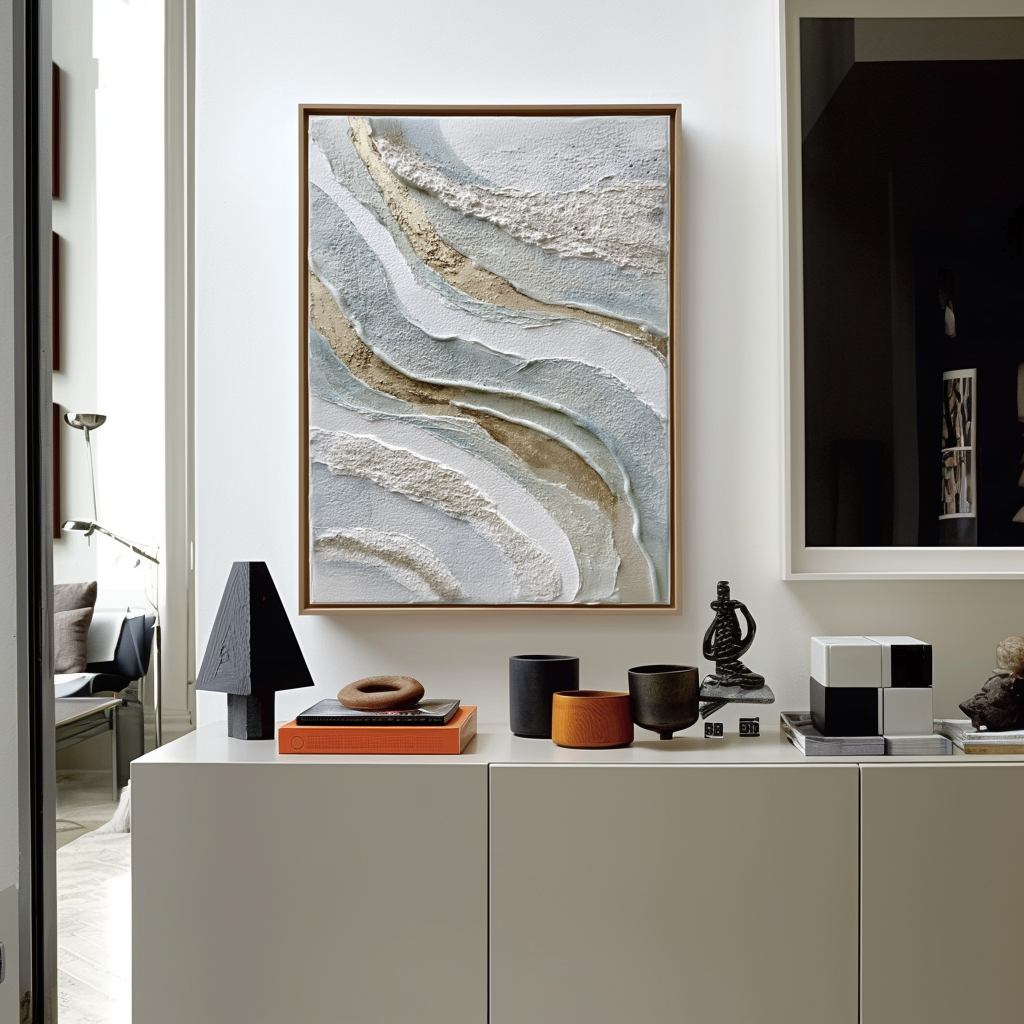 Textured abstract wall art with layered neutral tones in beige, white, and blue