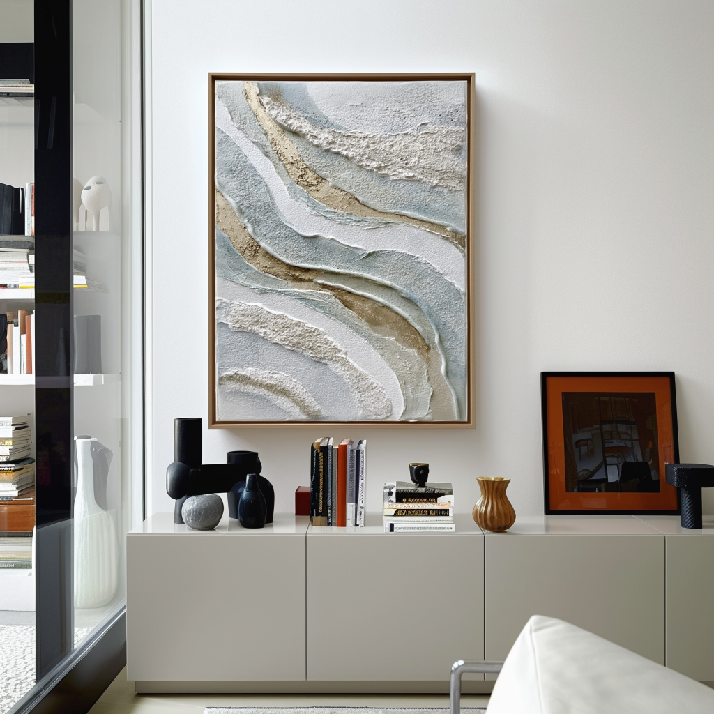 Textured abstract wall art with layered neutral tones in beige, white, and blue