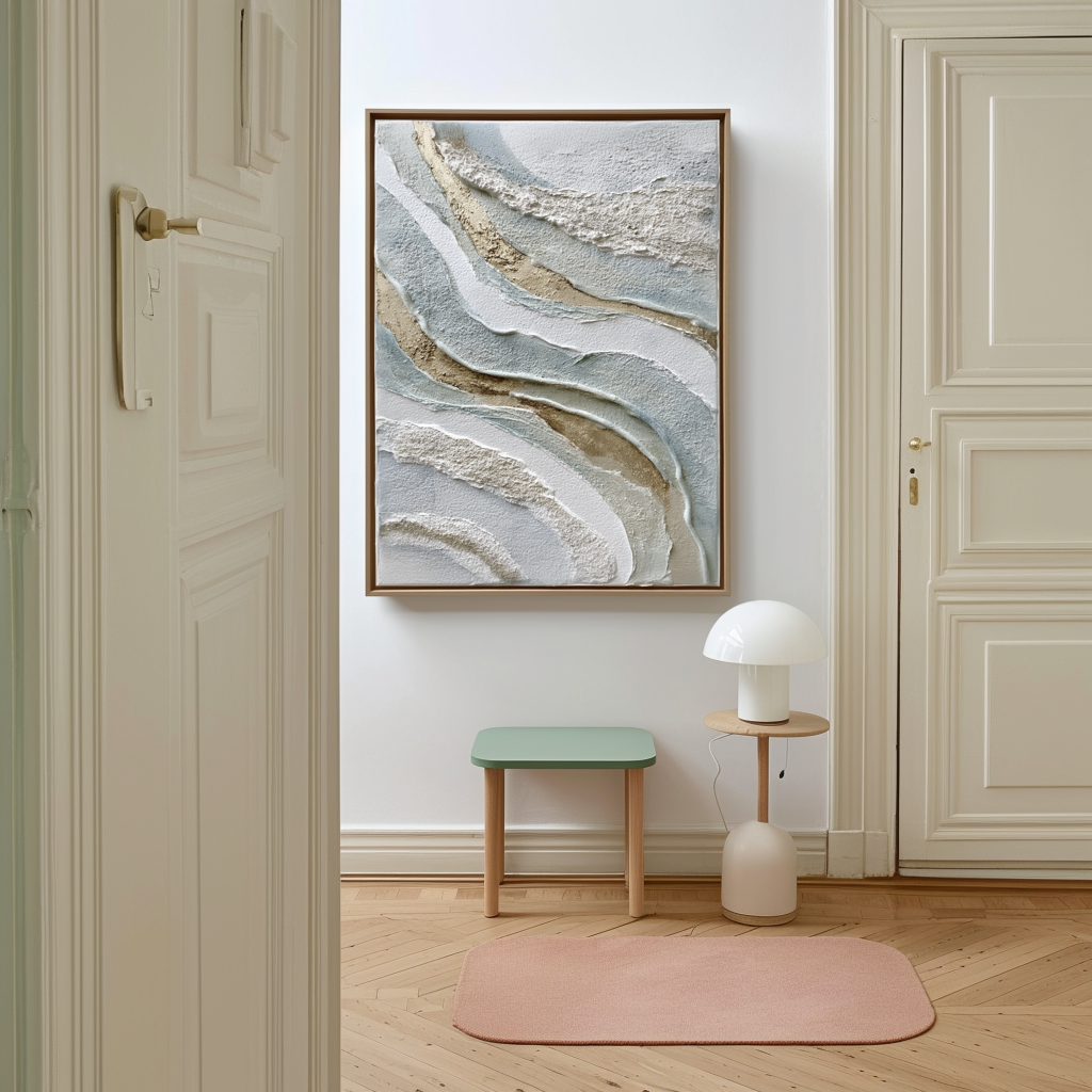 Textured abstract wall art with layered neutral tones in beige, white, and blue