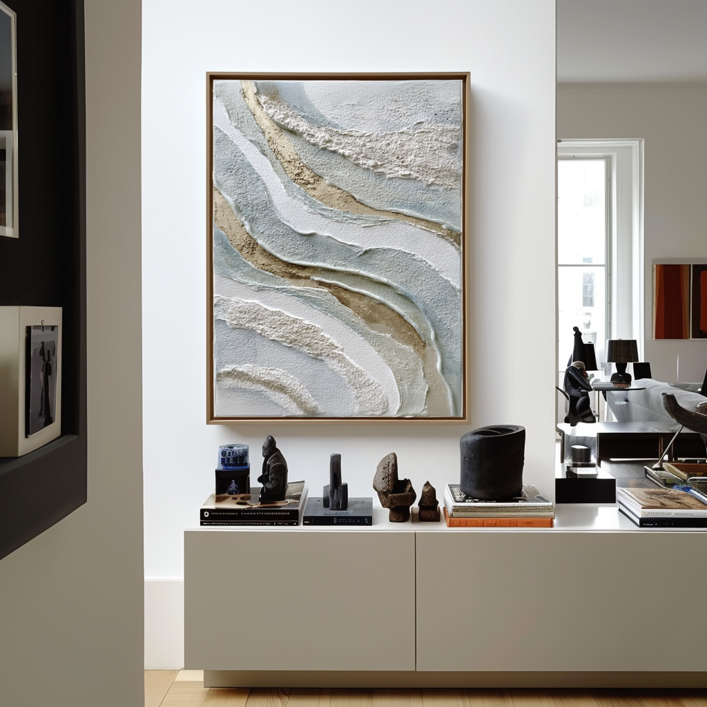Textured abstract wall art with layered neutral tones in beige, white, and blue